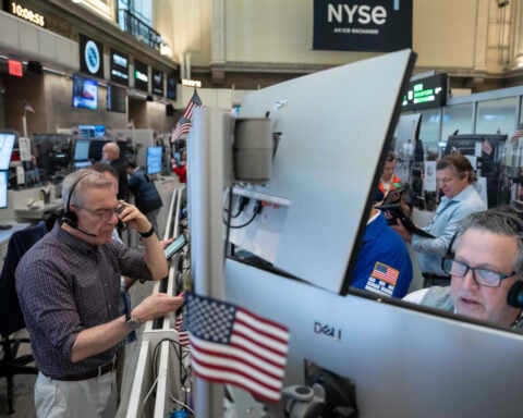 The first big batch of US profit reports for the summer has Wall Street mixed