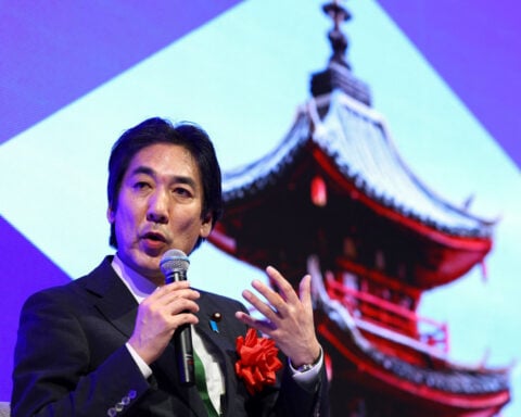 Japan economy minister stresses BOJ independence, rejects reflationist label