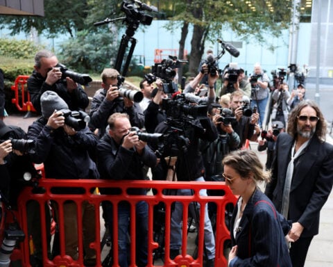 UK comedian Russell Brand's accuser tells jurors: 'I know he raped me'