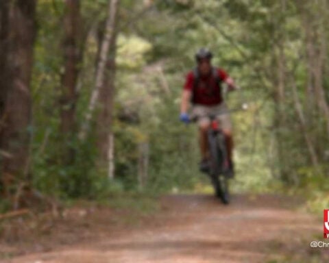 New Hampshire engineer designs custom mountain biking device for one-armed rider