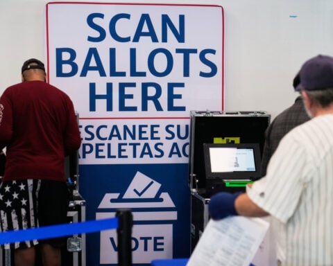 FACT FOCUS: Social media posts falsely claim ballots marked by a poll worker will be disqualified