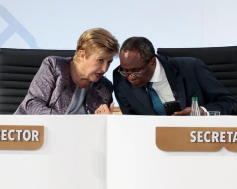 IMF chief urges cooperation on AI and war risks, as US hails economic momentum