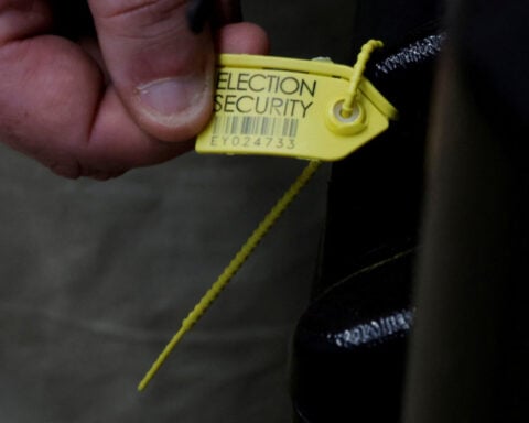 US tells election officials to be on guard against AI-powered tricks ahead of midterms