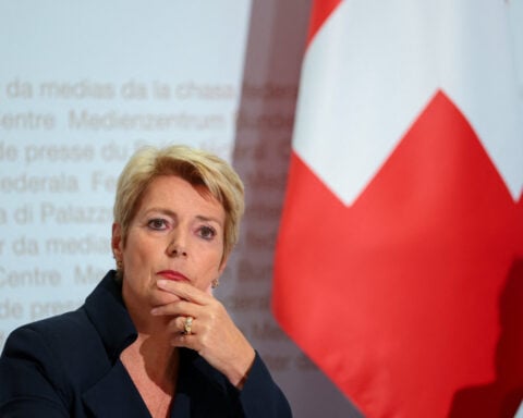 Swiss finance minister warns steep European debt could trigger euro crisis