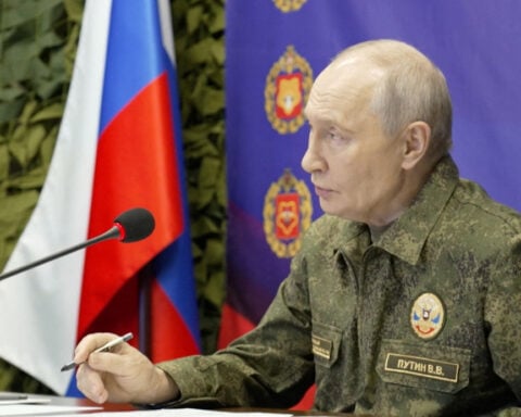 Putin says Russia is building non-negotiable 'security zone' in Ukraine along border