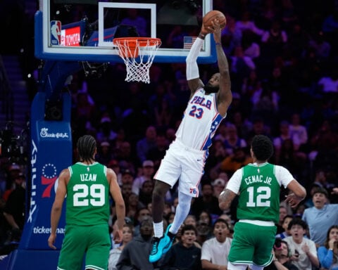 LeBron James calls helicopter rides 'transportation' after he soars on big dunk in 76ers home debut