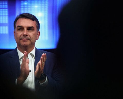 Brazil's Flavio Bolsonaro pledges fiscal adjustment, rejects cuts to social spending