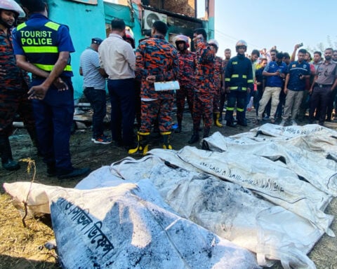 A fire guts a Bangladeshi beach resort, killing 10 people