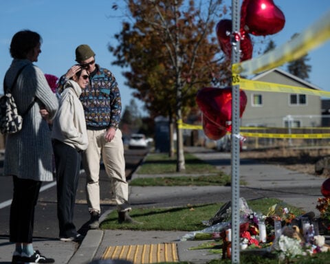 As an Oregon community mourns 4 killed in school shooting, 2 wounded survivors remain hospitalized