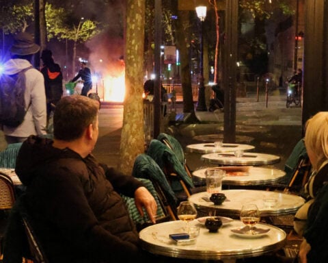 France counts the cost of worst unrest in years as tensions flare again in Paris