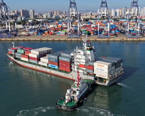 China's economy accelerates on robust exports as domestic weakness persists