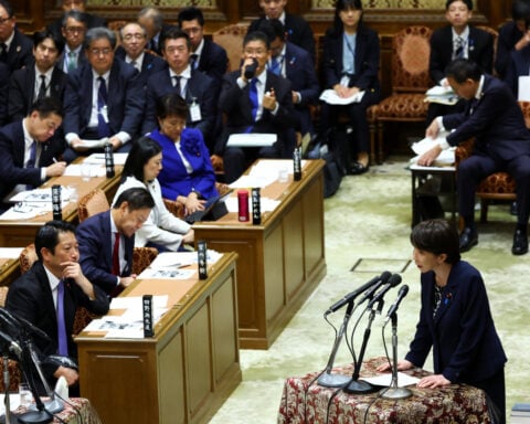 Japan PM says won't rule out debt issuance to fund tax cut