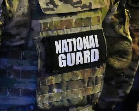 National Guard member is shot while breaking up a fight in Washington, suspect is hit in return fire