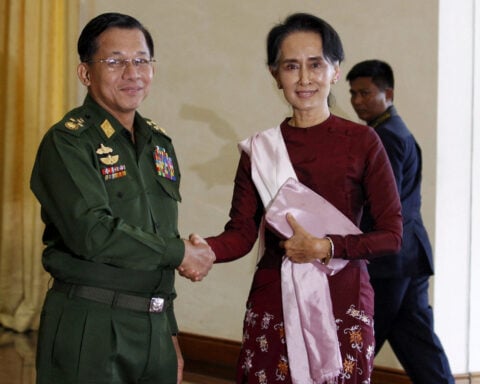 Myanmar authorities release rare images of Aung San Suu Kyi
