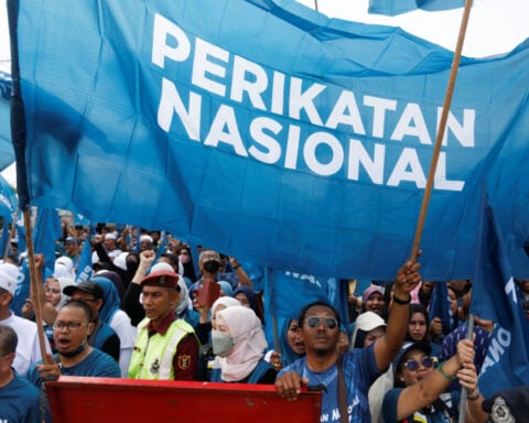 Malaysia de-registers main opposition bloc as elections loom