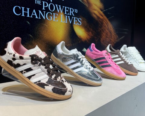 Germany's Adidas raises full-year profit outlook after record quarter