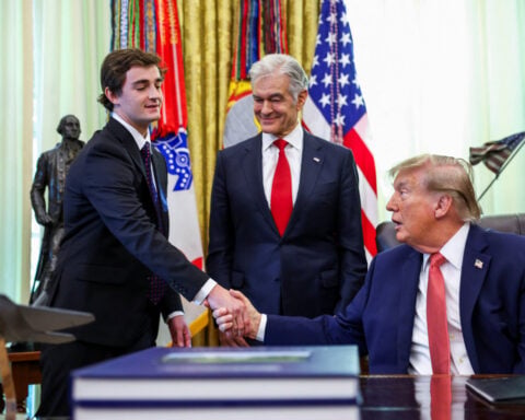 Trump promises cash for fraud tips as he awards right-wing YouTuber