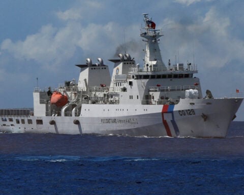China says it is 'safeguarding order' around Taiwan-controlled South China Sea atoll