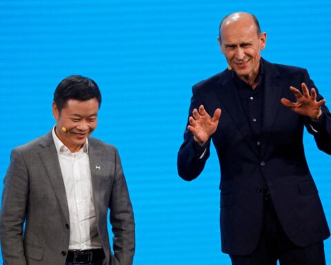 Auto industry bosses expect software, China growth to reshape sector by 2035, survey shows
