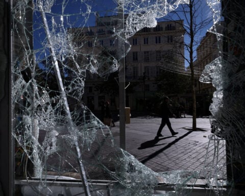 France's Macron vows order, calls foreign criticism of unrest 'stupid'