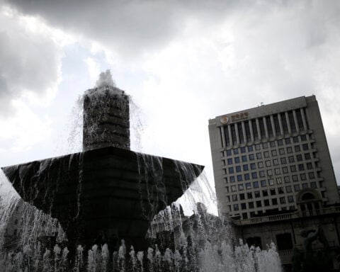 Bank of Korea holds rates, upbeat outlook points to future hikes