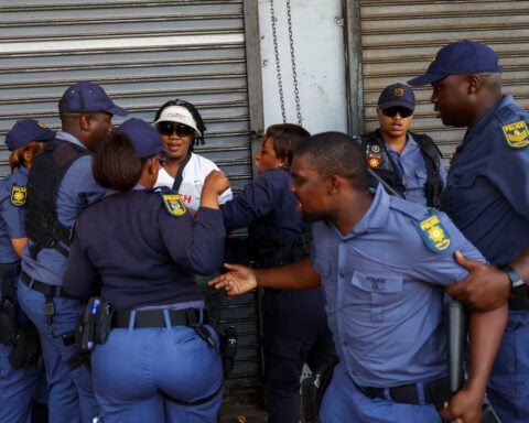 South African police investigate killing of foreign national by crowd