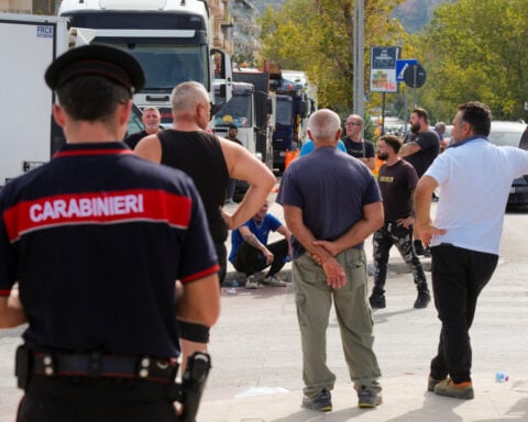 Southern Italy truckers ease protests as government approves aid