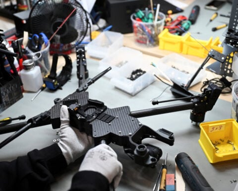 German business activity growth softens in October, PMI shows