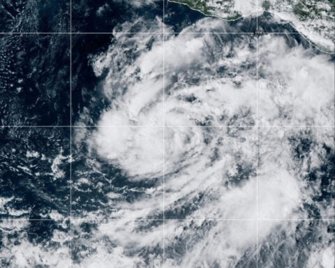 Vance becomes a hurricane as it churns off the coast of Mexico