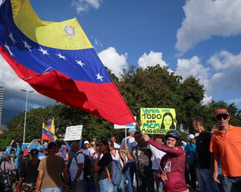 Awaiting Machado's return, Venezuela opposition looks ahead to elections