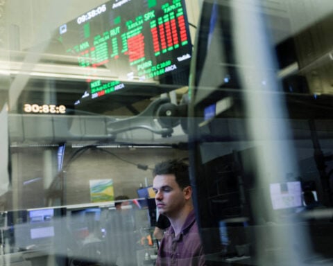 Wall Street closes lower to end rocky week