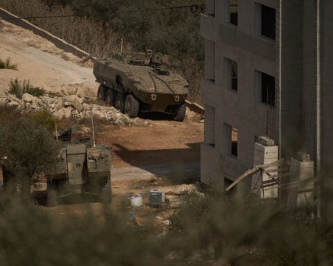 Israeli military says 2 soldiers were killed in West Bank attack that also left 2 gunmen dead