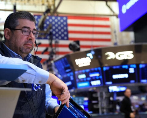 Stocks fall, but tech shares steady after selloff; oil hits highest in nearly six months