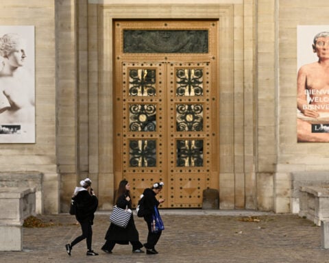 France's luxury stores board up windows ahead of fresh protests