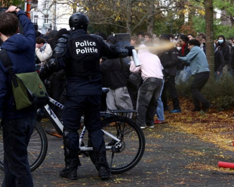 Belgian protesters and police skirmish at anti-government demonstrations in Brussels