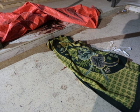 Survivor of deadly attack on Jordan church describes people crawling for their lives