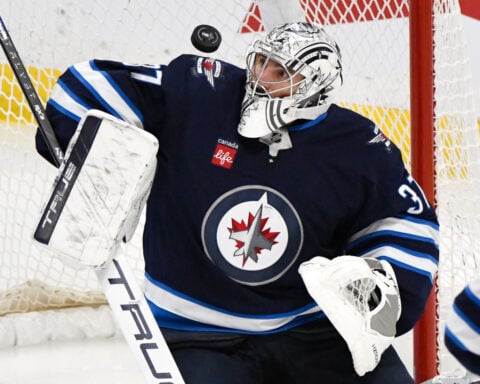 Connor Hellebuyck happy to be with the Devils after a long wait for a trade from the Jets