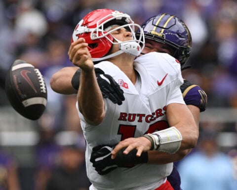 Aidan Chiles throws for 3 TD, runs in 2 more, and No. 24 Northwestern beats Rutgers 42-14