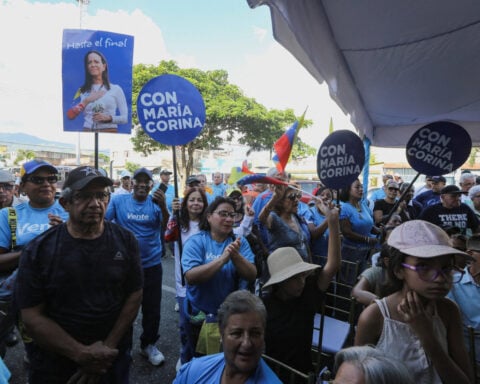 Venezuela opposition leader Machado returns home after fraught year away