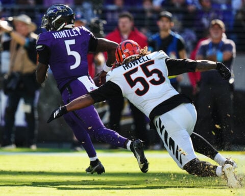Burrow throws 4 TD passes as Bengals storm past Jackson-less Ravens in 2nd half of 35-13 win