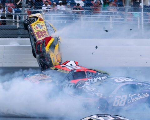 NASCAR race at Talladega stopped after Joey Logano's car goes airborne in scary 15-car wreck