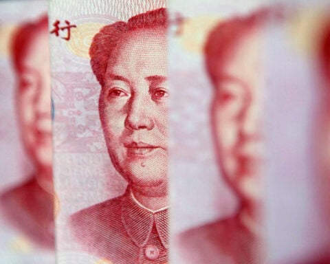 China's yuan climbs to fresh 4-year high ahead of key policy meetings