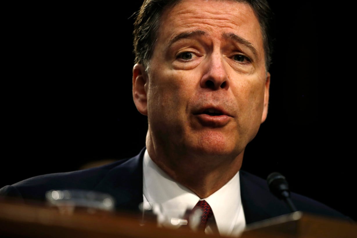 Former FBI Director Comey testifies before a Senate Intelligence Committee hearing in Washington