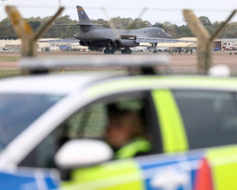 Two men charged in UK with helping Iran over RAF Fairford incident