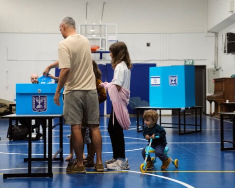 The Latest: Israelis vote in a tense election seen as a referendum on Netanyahu