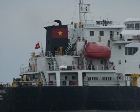 A US cruise ship suspends a global voyage in Asia due to fuel costs, stranding 200 passengers