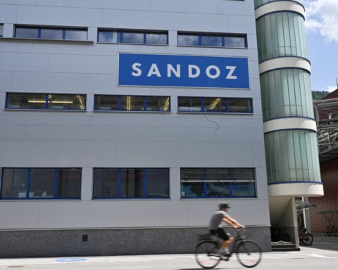 Generic drugmaker Sandoz's shares fall after sales outlook lowered 