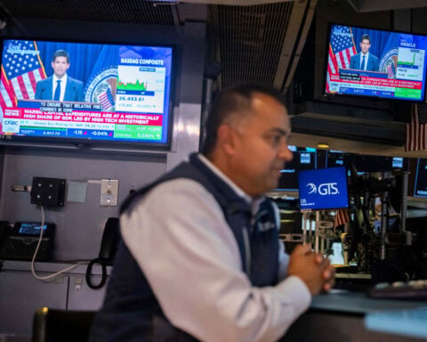 The bond market swings, but US stocks remain steady after the Fed says it won't raise interest rates
