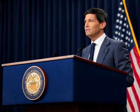 FOMC holds rates steady, markets rise modestly