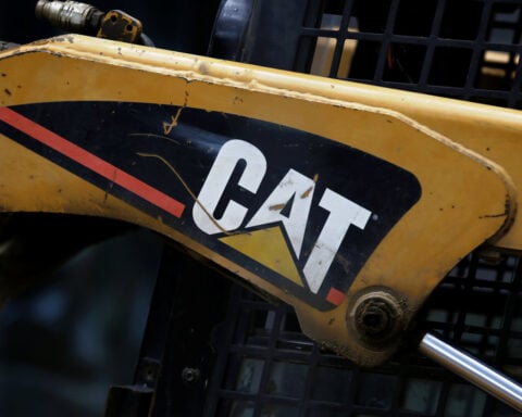Caterpillar tops quarterly profit view, but shares sink after unchanged annual growth forecast